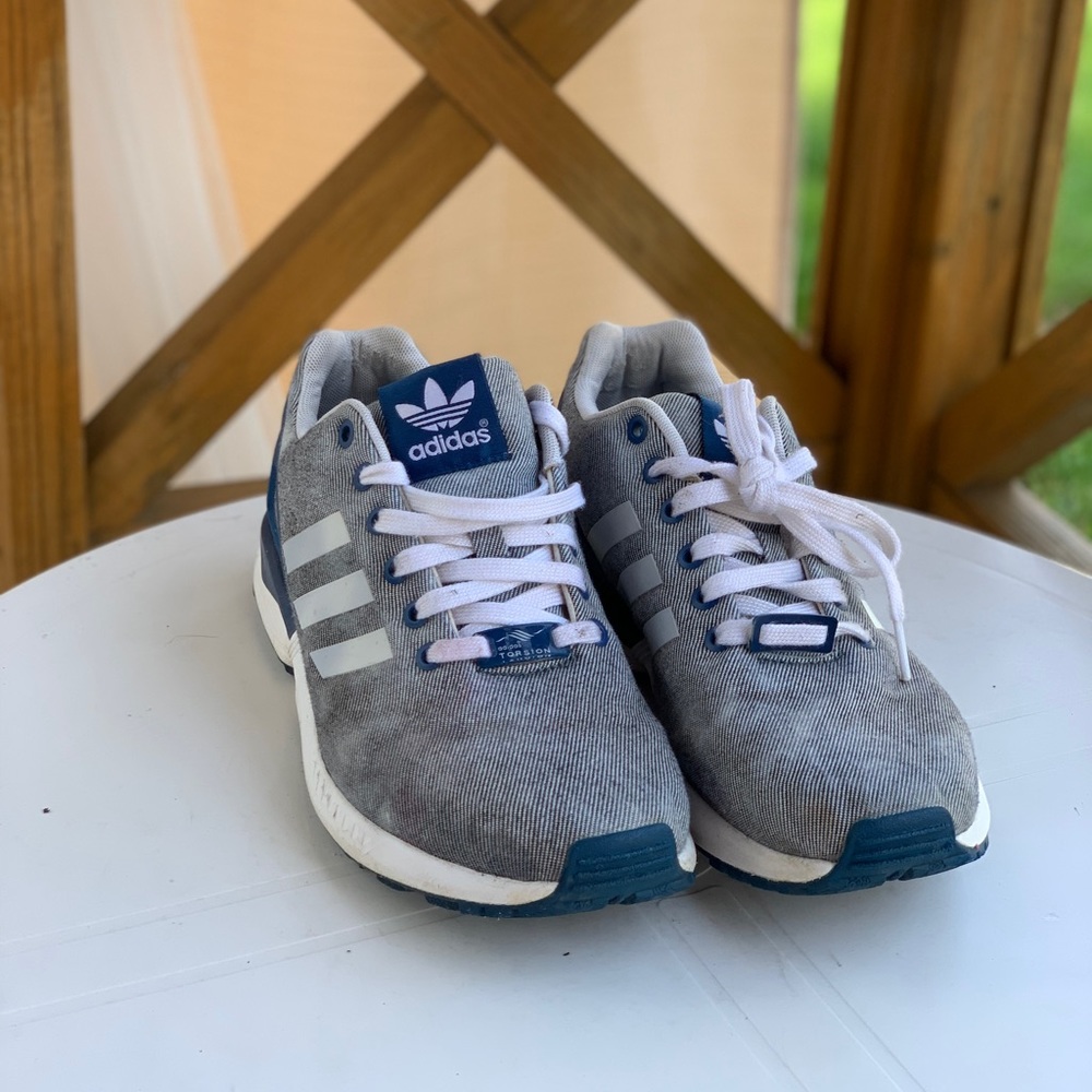 Blue and white adidas